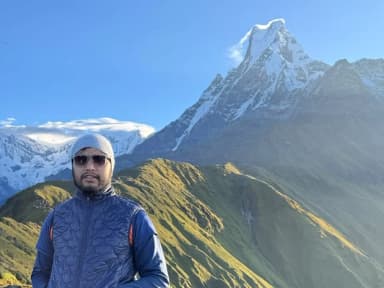 Amrit Nepal at the Mardi Himal viewpoint in September 2026, with Machhapuchhre behind